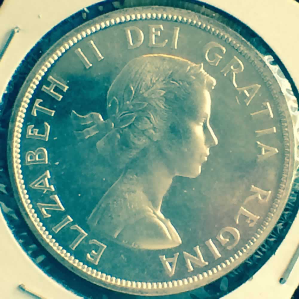 1959  Voyageur Silver Dollar 